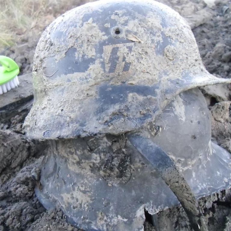 Relic of World War II excavated with a metal detector.